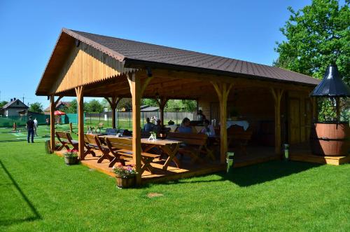Сад в Hotel Żubrówka Spa & Wellness