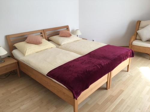 Postel nebo postele na pokoji v ubytování Tertianum Parkresidenz Meilen