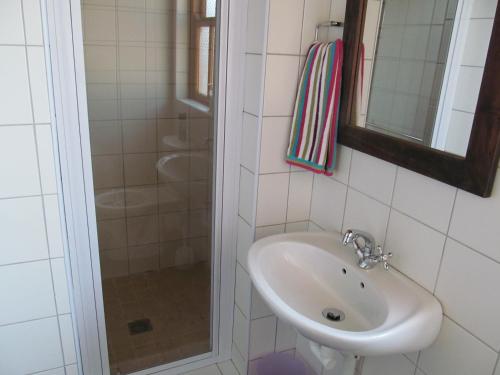 Ванная комната в Die Ou Huis Accommodation