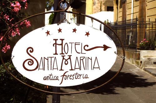 a sign that reads hotel santa ana fiesta at Hotel Santa Marina Antica Foresteria in Santa Marina Salina