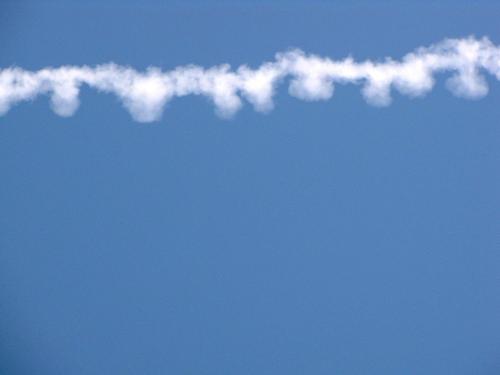 a trail of smoke in the sky at Hotel Santa Marina Antica Foresteria in Santa Marina Salina