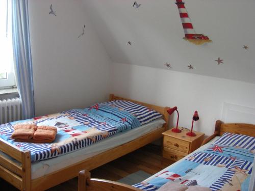 Postel nebo postele na pokoji v ubytování Ferienwohnung Kreider