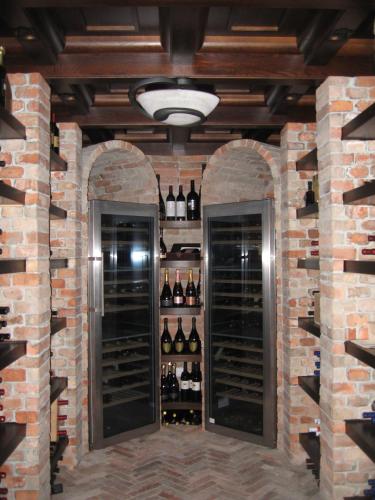a wine cellar with two racks of wine bottles at Chalet Caprea in Bad Kleinkirchheim