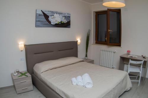 Postel nebo postele na pokoji v ubytování B&B Villa Gaudium