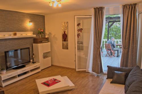TV a/nebo společenská místnost v ubytování Apartman Gizdavac