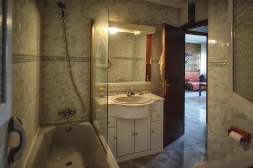 Ванна кімната в Apartamento Jardines Vía Parque