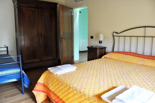Postel nebo postele na pokoji v ubytování Agriturismo Campo del Pillo