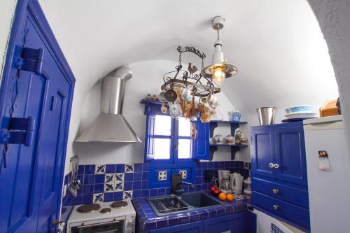 Kuchyň nebo kuchyňský kout v ubytování Ifestio Villas Oia
