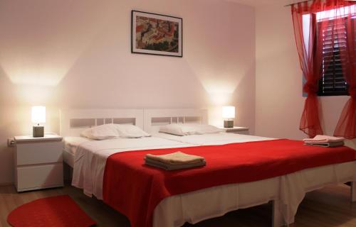 Postel nebo postele na pokoji v ubytování Illy City Centre Apartment