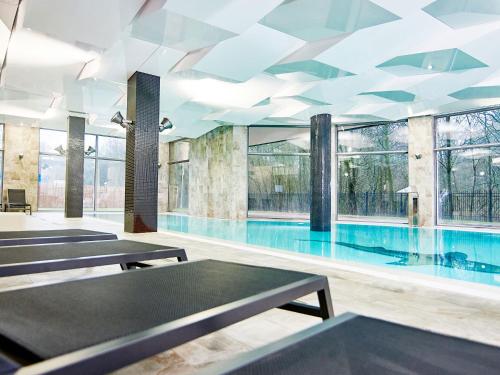Bazén v ubytovaní VacationClub - Diune Apartment 231 alebo v jeho blízkosti
