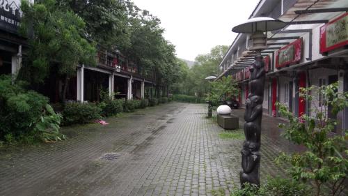 an empty street in an old town with buildings at Sanyi Dream Garden B&B in Sanyi