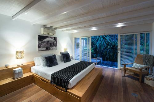 Un pat sau paturi într-o cameră la Villa Tranquilla