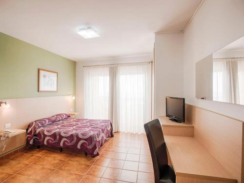 Postel nebo postele na pokoji v ubytování Hotel Ucanca