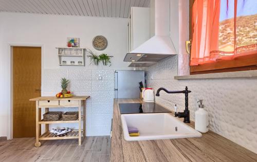 Kuchyň nebo kuchyňský kout v ubytování Lantana Apartment