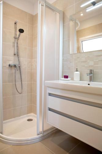 a bathroom with a shower and a sink at Can Carlos Ibiza in Sant Jordi