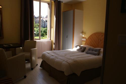 Postel nebo postele na pokoji v ubytování Hostellerie La Terrasse