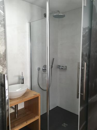 a bathroom with a shower and a sink at Hotel Engel in Oberstdorf