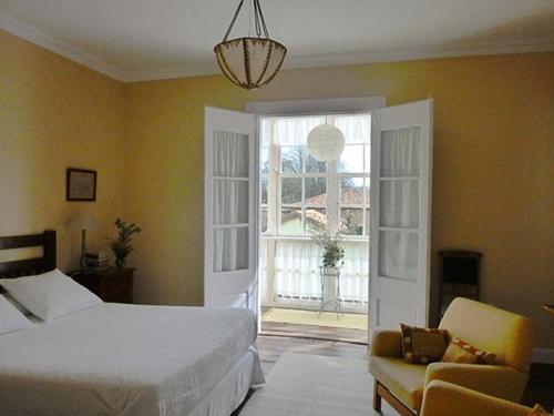 Cama o camas de una habitación en La Casona Azul, espectacular palacio indiano