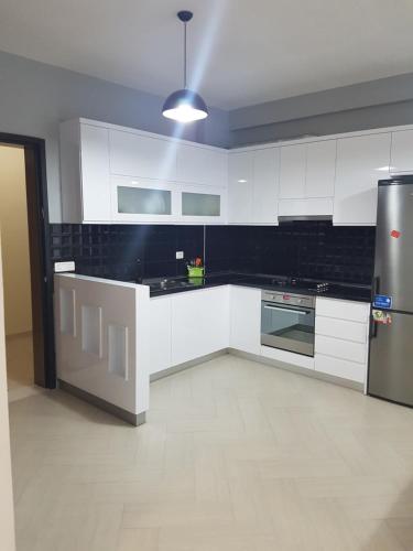 Η κουζίνα ή μικρή κουζίνα στο Modern cozy apartment seaview
