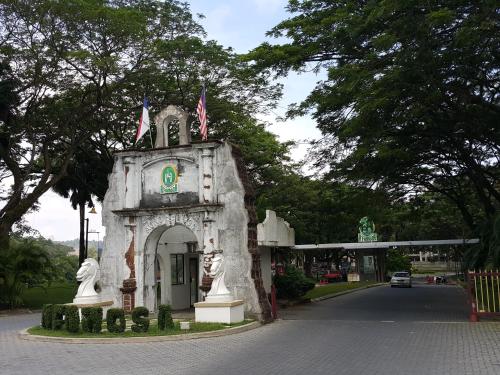 a small building on the side of a road at D Savoy Famosa Condo in Melaka