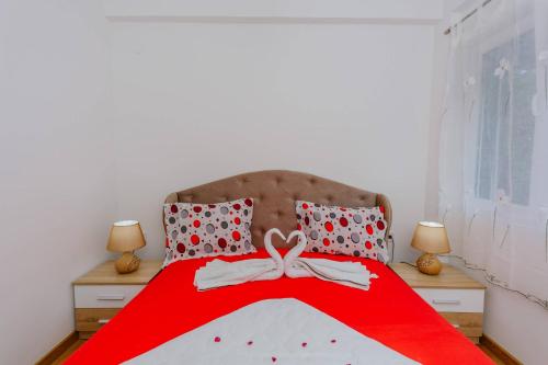 Ένα ή περισσότερα κρεβάτια σε δωμάτιο στο Paradise Bay Apartments