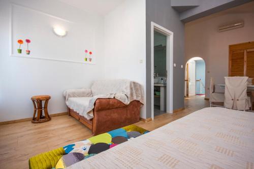 Llit o llits en una habitació de Villa Rosa
