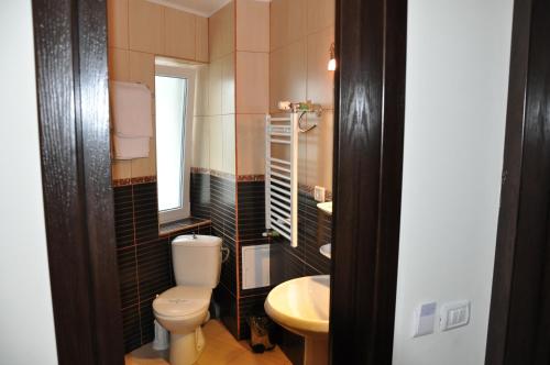 Ein Badezimmer in der Unterkunft Hotel Golden Beach
