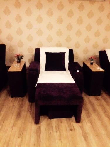 Coin salon dans l'établissement Van Giang Hotel