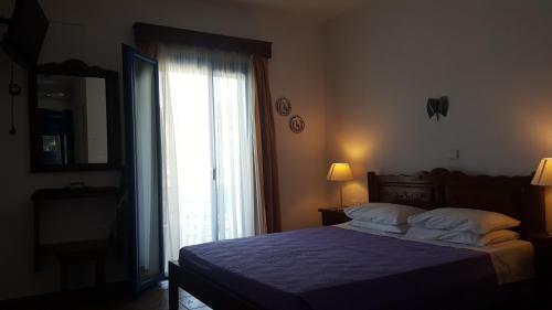 Postel nebo postele na pokoji v ubytování Linaria Bay