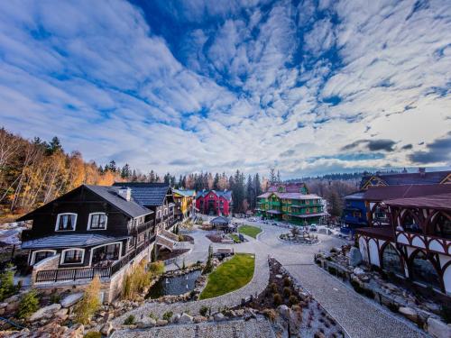 an aerial view of a small town with houses and buildings at Norweska Dolina Family&Pet-friendly Resort in Szklarska Poręba