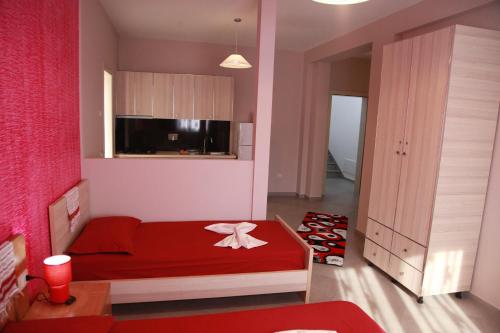 Postel nebo postele na pokoji v ubytování Hotel Shkodra L