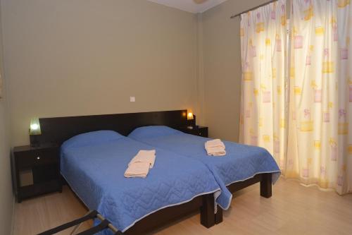Alexandra Apartmentにあるベッド