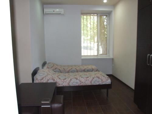 Ένα ή περισσότερα κρεβάτια σε δωμάτιο στο Apartment Paronyan 22