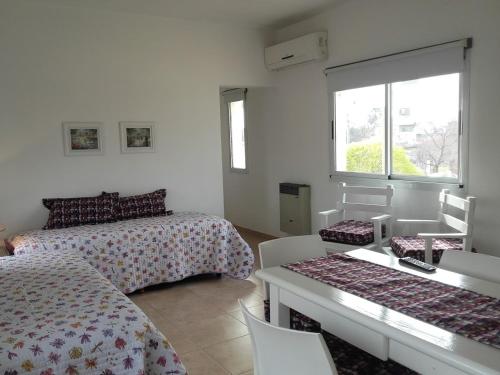 Giường trong phòng chung tại "Los Abrojos" 2