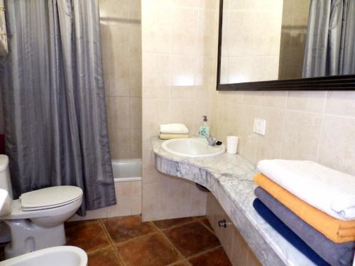 Ванна кімната в Apartamentos Medano - Atico Playa