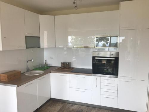 Køkken eller tekøkken på Holiday Home Sunrise