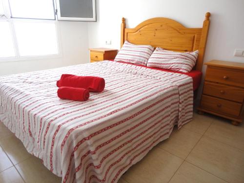 Llit o llits en una habitació de Apartamento aeropuerto playa