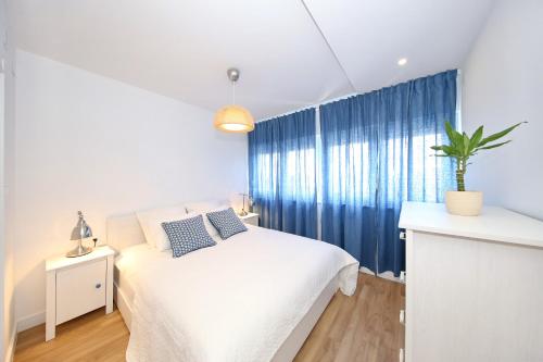 Ένα ή περισσότερα κρεβάτια σε δωμάτιο στο Porat Apartment