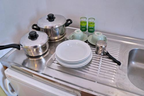 Kuhinja ili čajna kuhinja u objektu Pefka Rooms
