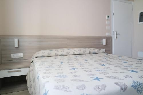 Ένα ή περισσότερα κρεβάτια σε δωμάτιο στο Hotel Villa San Giuseppe