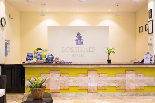 a lobby of a los angeles hotel at Hotel Los Itzaes by 5th av in Playa del Carmen