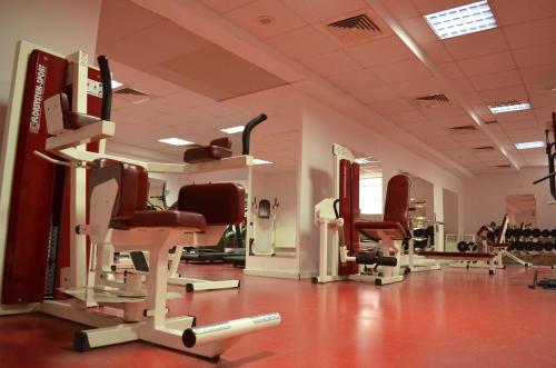 a large room with several chairs in a salon at Casa Remo - Guesthouse in Turda