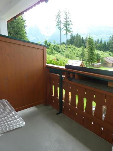 a balcony with a view of a mountain at Appartement-Pension Familie Gewessler in Bad Mitterndorf