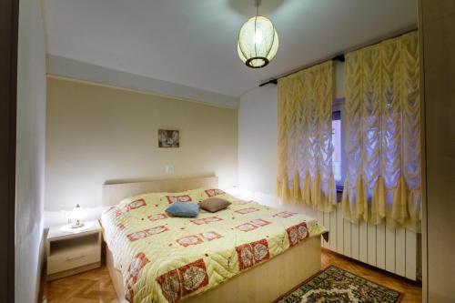 Postel nebo postele na pokoji v ubytování Apartments Jasna