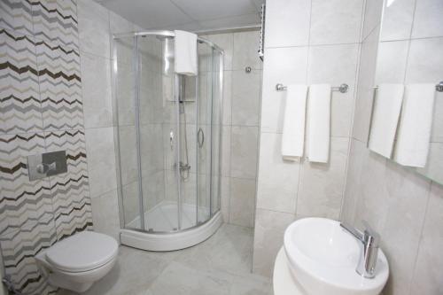 Koupelna v ubytování Pruva Prestige Hotel