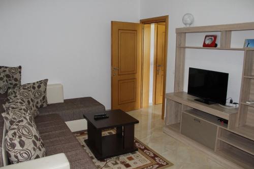TV a/nebo společenská místnost v ubytování Apartments Casa Mia