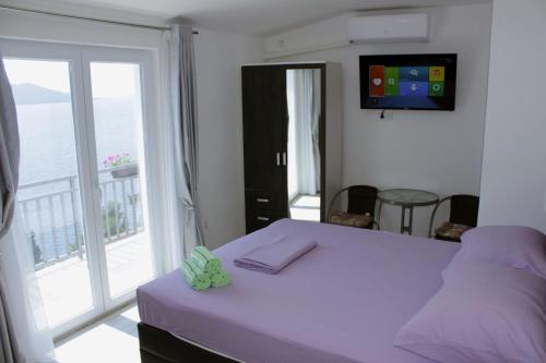 Postel nebo postele na pokoji v ubytování Guest House Put