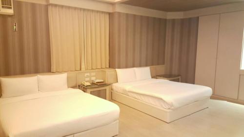Wind Coast Motelにあるベッド
