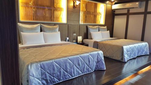 Wind Coast Motelにあるベッド