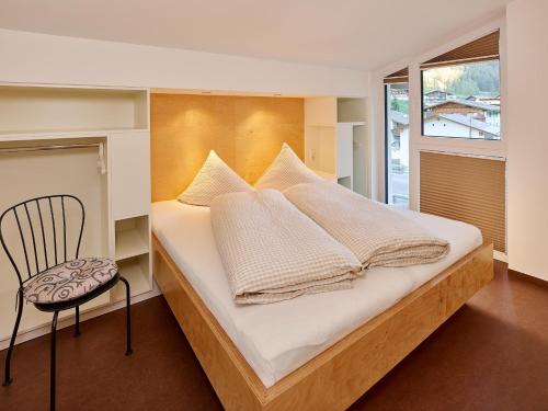 Кровать или кровати в номере Apart Benedikt